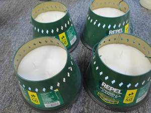 lot of 4 repel citronella candles ...