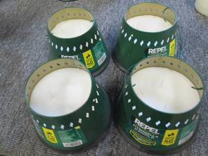 lot of 4 repel citronella candles ...