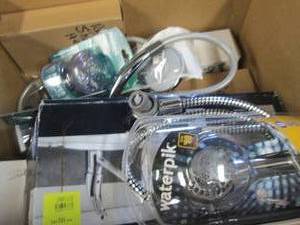 box of shower heads and faucets ...