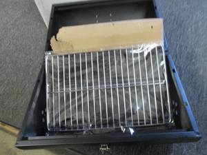 small round charcoal grill ...