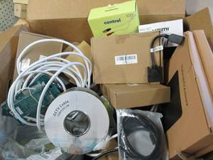 box of hdmi cables, rolls of cctv c...