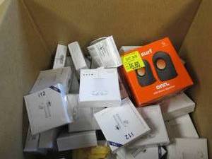 lot of wireless ear buds and speake...