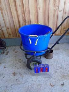 Poly rolling yard cart. Good used condition. As shown.