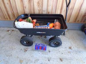 Gorilla brand dump yard cart. Poly tub. Lightly used. As shown.