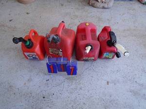 Qty of 4 gas cans. As shown.
