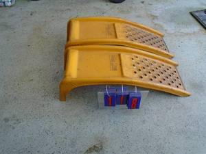Qty of 2 heavy duty metal car ramps. Lightly used. 9000 lb rated. As shown.