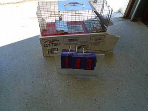 Small live trap in box. Looks nearly new. As shown.