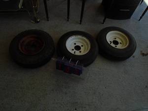 Qty of 3 4 hole 480x8 trailer tires. 2 look new. As shown.
