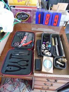 Flat of misc smokevape items & repair kit. As shown.