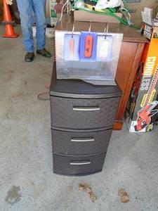 3 drawer wicker style cabinet. As shown.