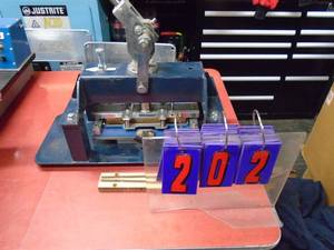 Nitto flat belt splicer cutting tool with extra blades. Used with lot item # 203. THIS ITEM HAS A RESERVE.