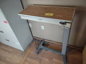 lot 412 image: Hill-Rom PMjr Adjustable Height Ove...