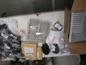 Tablecloths, wire racks, many black...