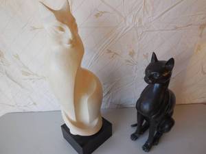 lot 46 image: 2-Cat Art Pieces Light One Is Plastic 24, Dark One Is Metal 18