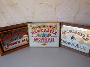 lot 47 image: 3-New Castle Brown Ale Signs-All 20x16 2-Mirrors, 1-Wooden