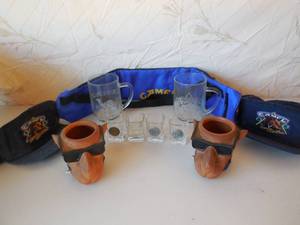 lot 49 image: Joe Camel Related 2-Cordury Hats, 2-Plastic Can Holders, 2-Mugs, 4-Shot Gasses & Portable Can Cooler