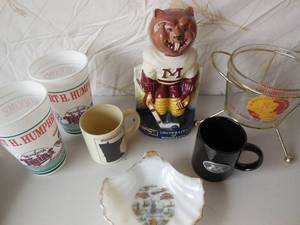lot 59 image: Minnesota Memorabilia U Of M Hockey Ezra Brooks Bottle, Centennial Glass Bucket In Holder, Old MN Shell, Cups