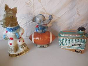 lot 62 image: 2-Jim Beam Bottles Donkey (Dem) & Elephant (Rep), 1-Ezra Brooks Trolley Car