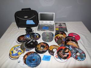 lot 158 image: Portable DVD Player With Case & Many DVDs