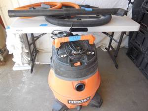 lot 193 image: Rigid 14-Gallon Shop Vac With Attachments
