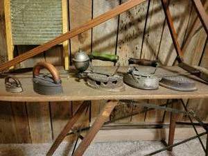 lot 25 image: Primitive Collection of Sad Irons & Wooden Ironing Boards