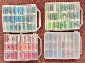 lot 142 image: Double Sided Thread Cases Full of Thread