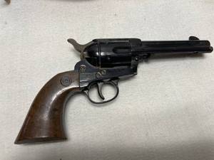 lot 257 image: Vintage Metal Ammo Box With Daisy BB Gun and Leather Holster