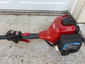 lot 280 image: Toro Gas Powered Weed Whip