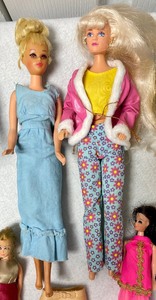 lot 329 image: Vintage Barbies and More