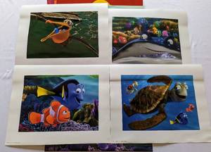 lot 349 image: Disneys Finding Nemo, The Incredibles and Monsters Inc Lithograph Sets