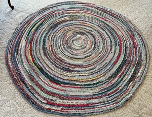 lot 12 image: Lovely Round Vintage Braided Rug
