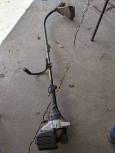 lot 57 image: Ryobi 4 Cycle Gas Trimmer...