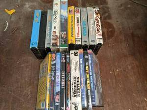 lot 103 image: Box of DVDs and VHS Tapes See Pho...