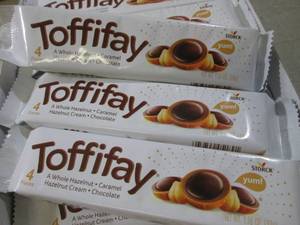 lot 214 image: (B-1) 20 4pc Packs of Toffifay Cand...