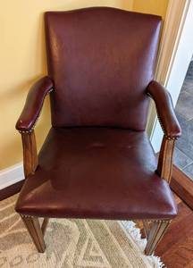 lot 25 image: Burgundy Leather Armchair