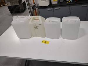 lot 78 image: (4) Poly Jugs...