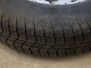 lot 13 image: (1) Unused Carrier-Star ST20575D14 Trailer Tire On 5-Lug Steel Rim