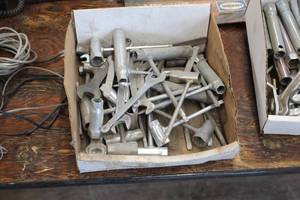 lot 1034 image: Lot of (1 Box) Plug Pullers and Wrenches