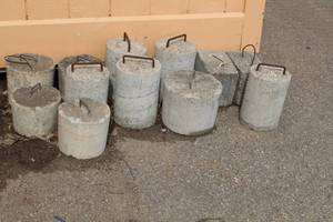 lot 952Y image: Lot of (4) 30-40lb Tent Weights