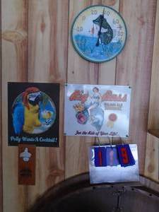 All items hanging on wall. Tin signs, thermometer, etc. As shown.