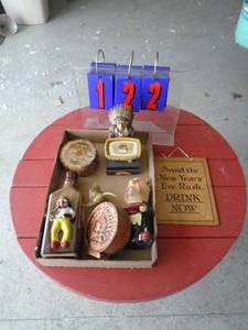 Flat of collectible bank & bottles. As shown.