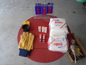 Spark plugs, wipe towels, oil filter wrench, etc. As shown.