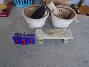 Planters & small cement stand. As shown.