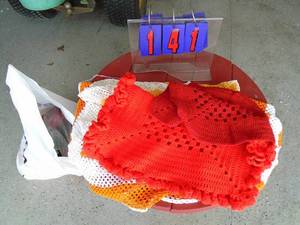 Bag of knitted items. As shown.