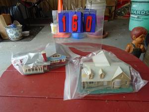 Qty of 2 plastic buildings. Made in tiawan. As shown.
