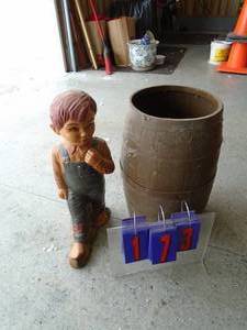 Small plastic keg & boy statue. As shown.