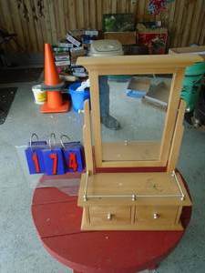 Small wood mirror stand with drawers. As shown.