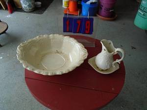 Basin & pitcher. Both have a few cracks. As shown.