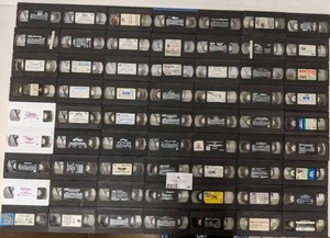 lot 152 image: 63 Assorted VHS Tapes--Barney  -Care Bears  -Winnie The Pooh  -Teletubbies  -Elmo  -The Land Before Time  -The Parent Trap  -101 Dalmations  -Digimaon  -Little Audrey  -Benny & June  -New Jack City  -The Astronauts Wife  -Jerry Springer  -And More