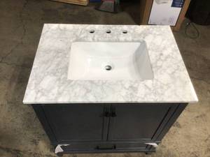 Home Decorators Collection Merryfield 31 in. W x 22 in. D Bath Vanity in Dark Blue-Gray with Marble Vanity Top in Carrara White with White Basin (has damage on the top minor) scratches on the back review all pictures
